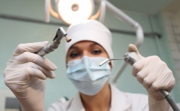 Dentist with instrument